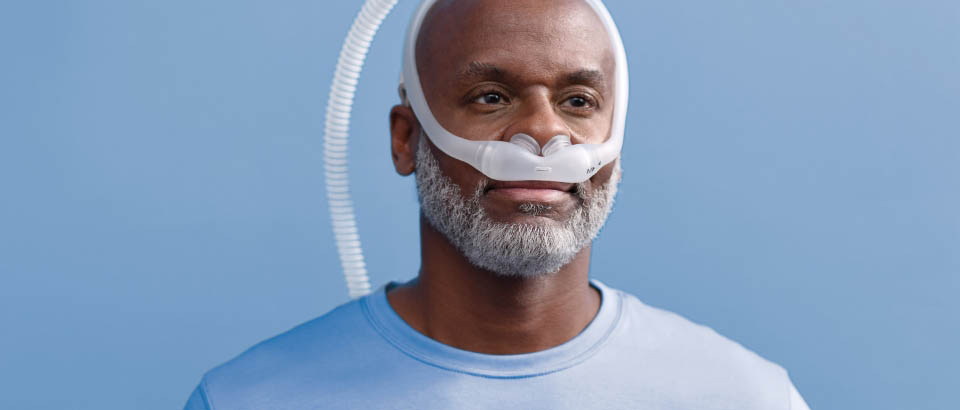 Man with a beard wearing a mask   